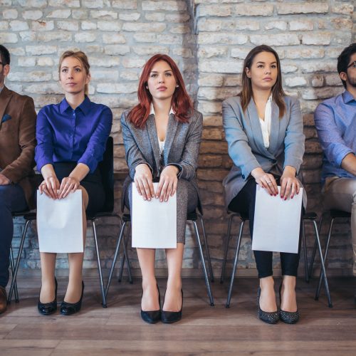 Photo of candidates waiting for a job interview